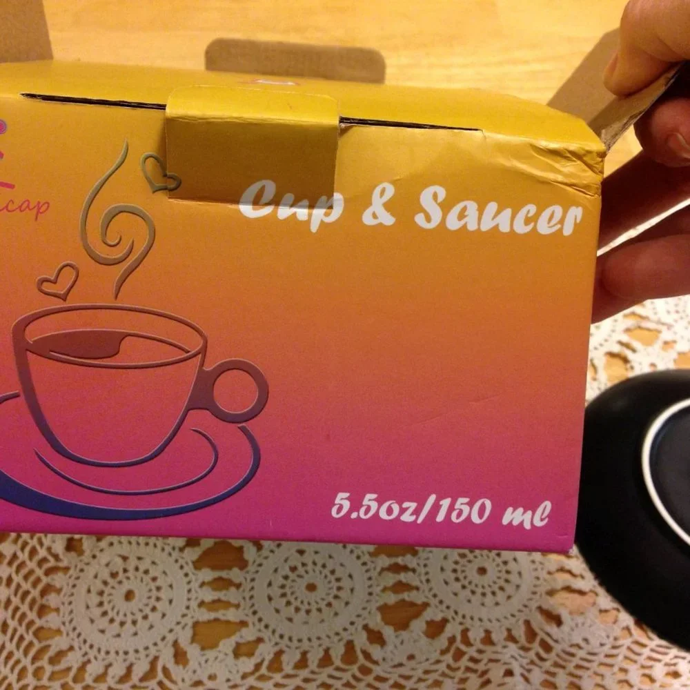 Pretty small coffee cup and saucer, new